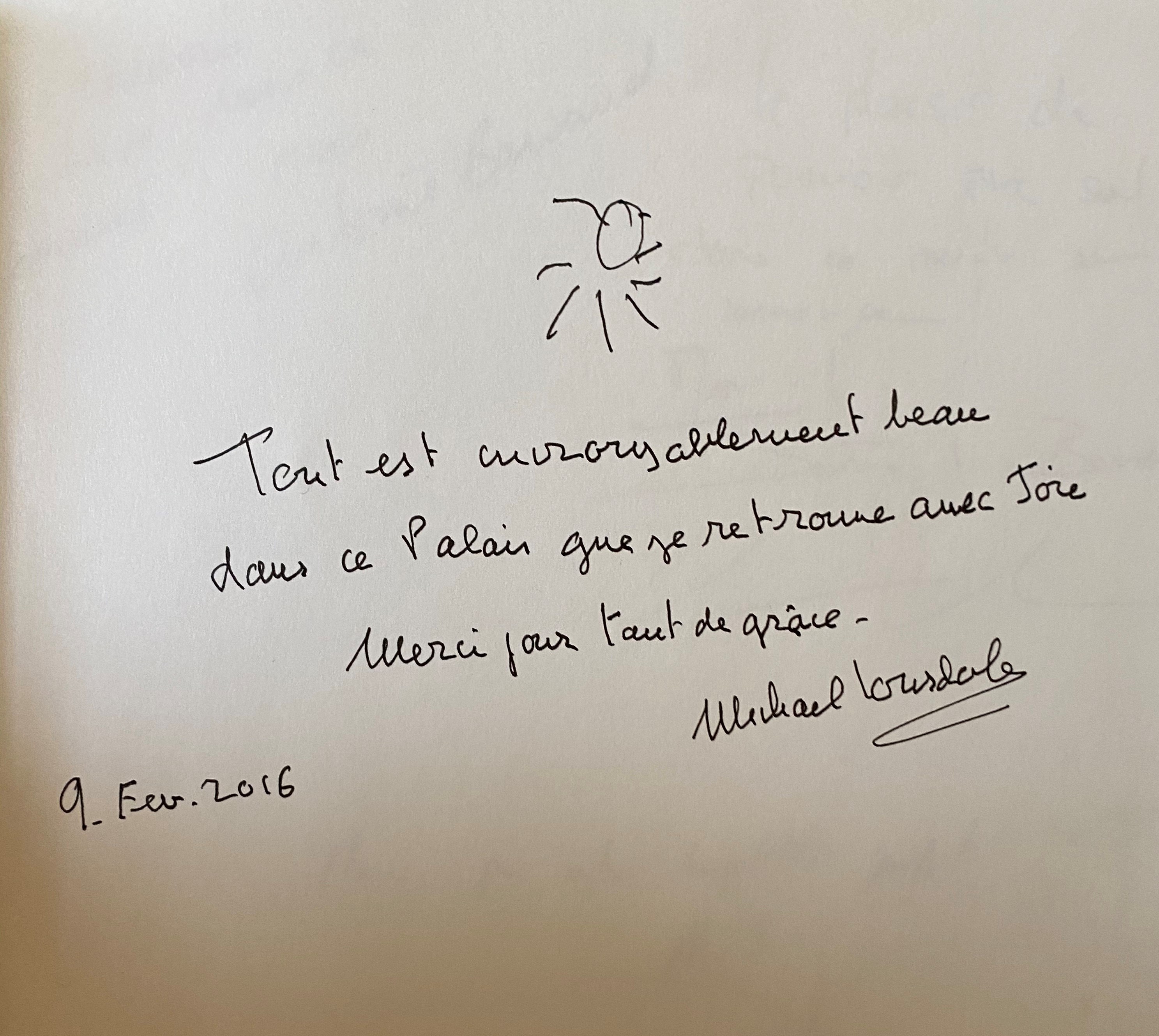 Photographie du message de Michael Lonsdale dans le livre d'or